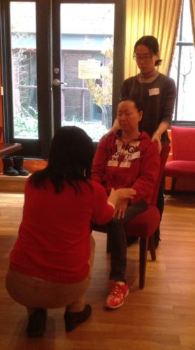 The Therapeutic Touch Triad with Etsuko and Mariko offering Mayumi a session.